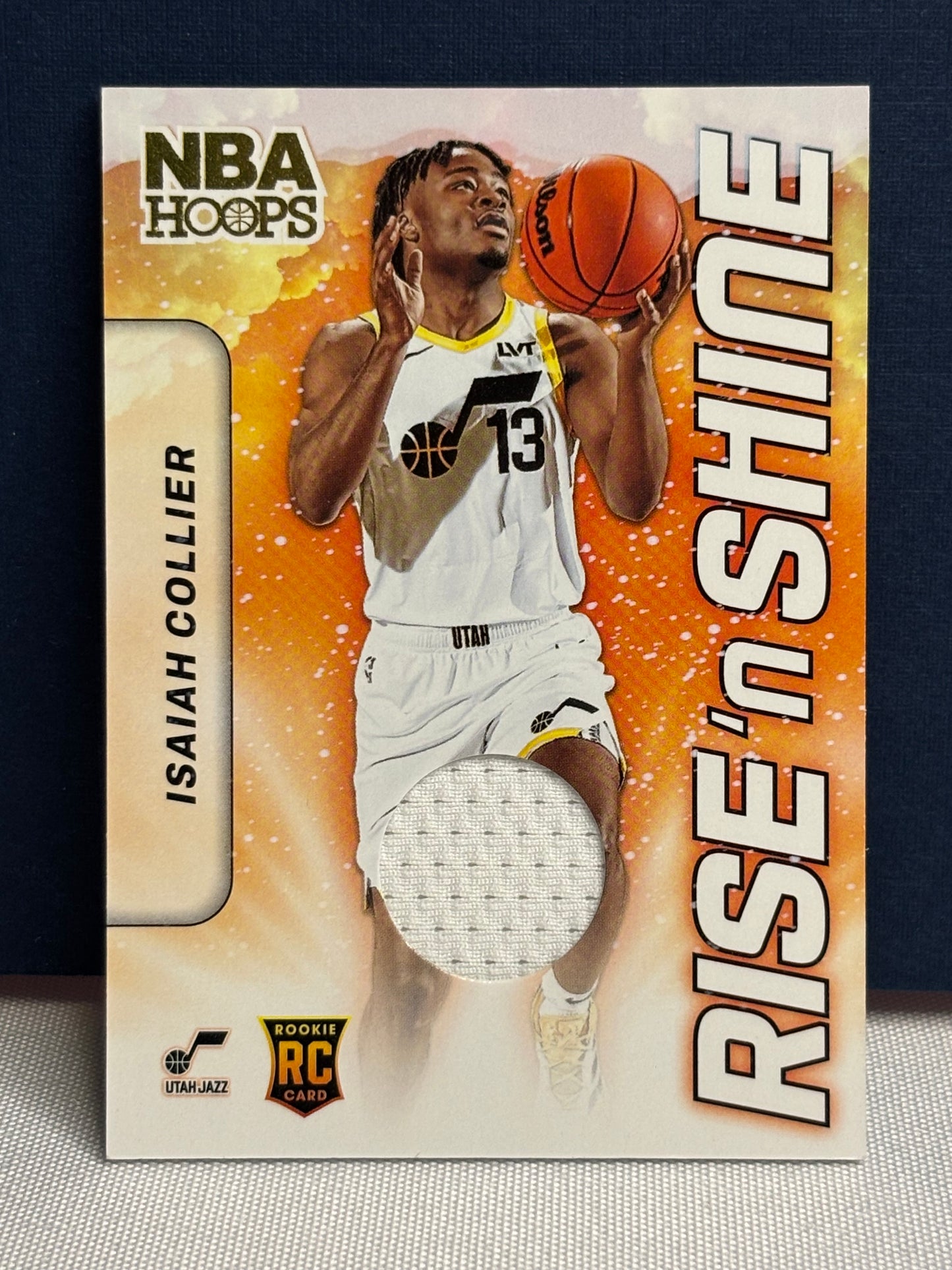 2024-25 Hoops Rise ‘n Shine: Isaiah Collier Rookie Card (material)
